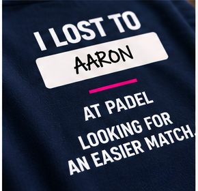 Close-up of the I LOST TO AARON chest print